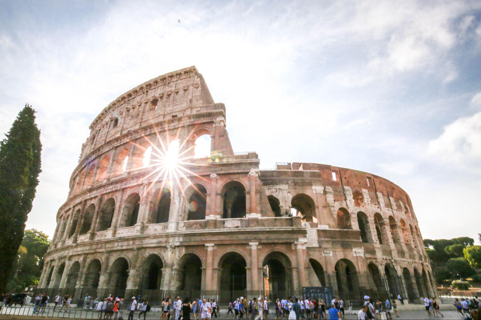 Colosseum in Rome with afternoon sunlight